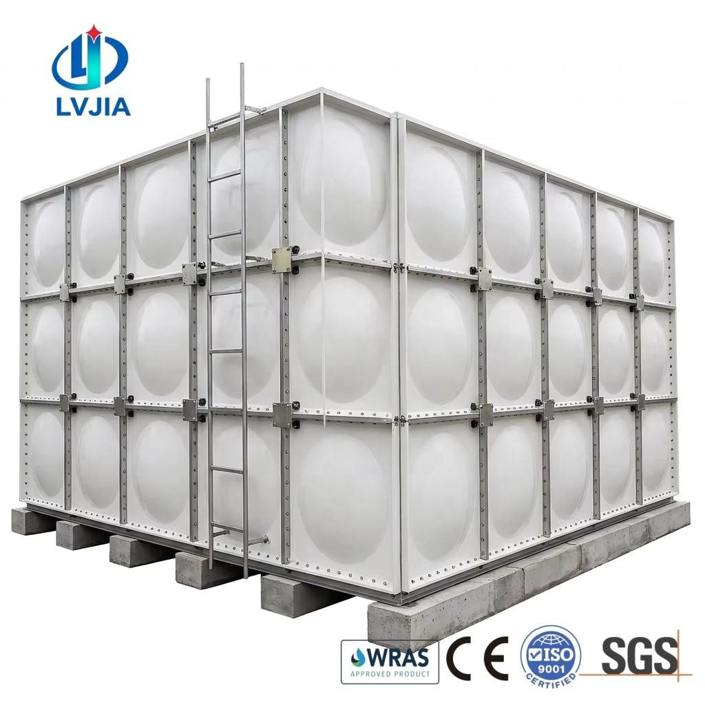 GRP sectional water tank being bolted together inside a plant room