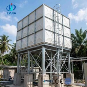 Galvanized Water Tower Tank, Elevated — galvanized water tower tank — sectional panels being assembled on site