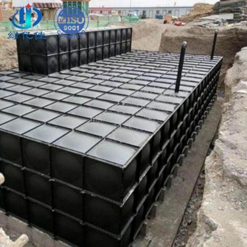 300 m³ BDF underground water storage tank assembled in an open excavation, with access risers on the roof