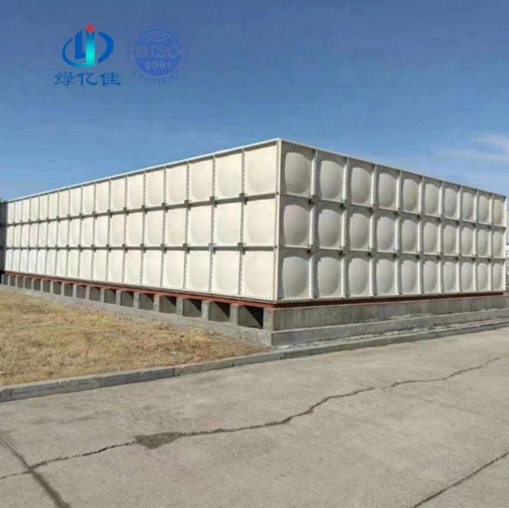 Long GRP sectional water tank on a concrete pad, the bolted SMC panel type used in the GRP water tank Netherlands order