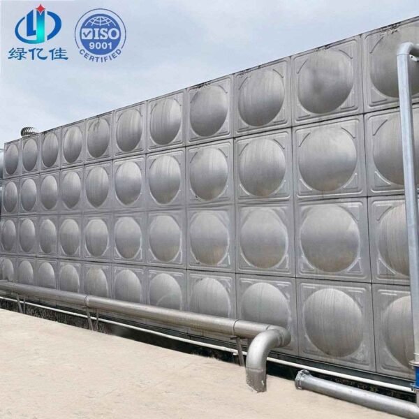 Insulated Stainless Steel Tank, Reservoir — insulated stainless steel tank — sectional panels being assembled on site