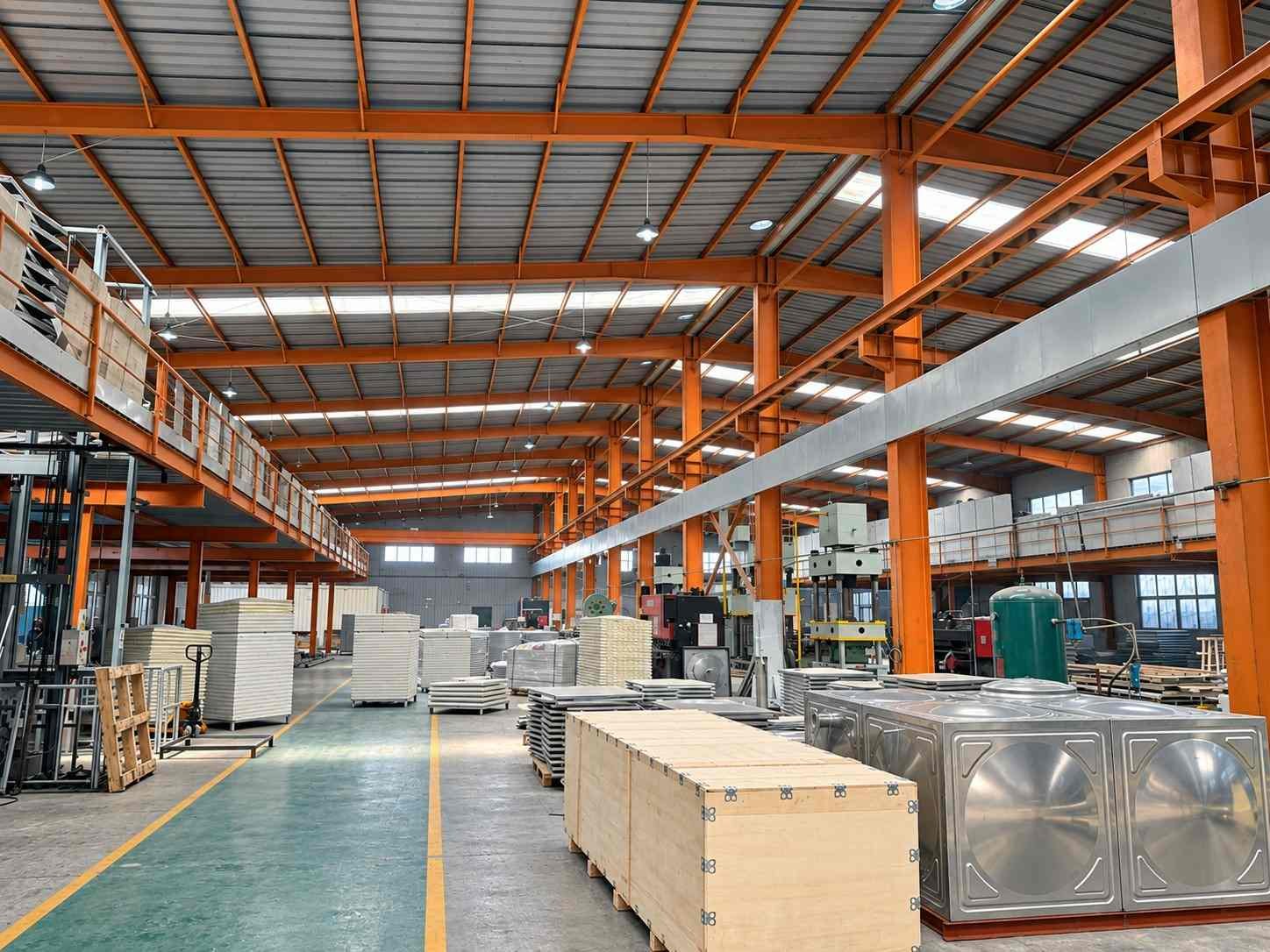 LVJIA workshop floor with stainless steel panel tanks and packed panels